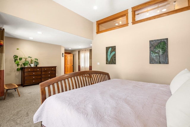 carpeted bedroom featuring recessed lighting