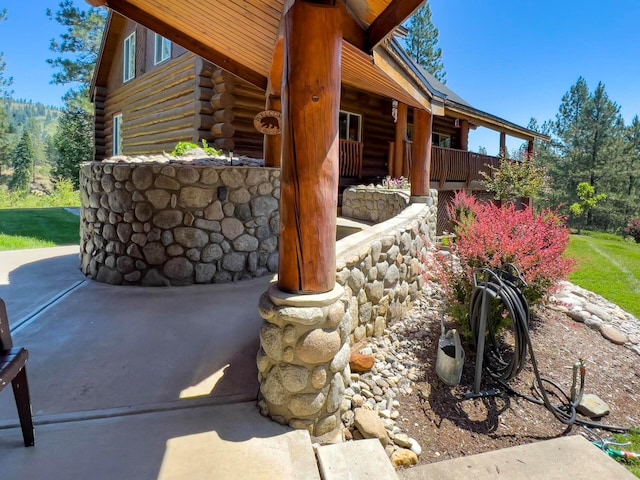 view of home's exterior with log exterior