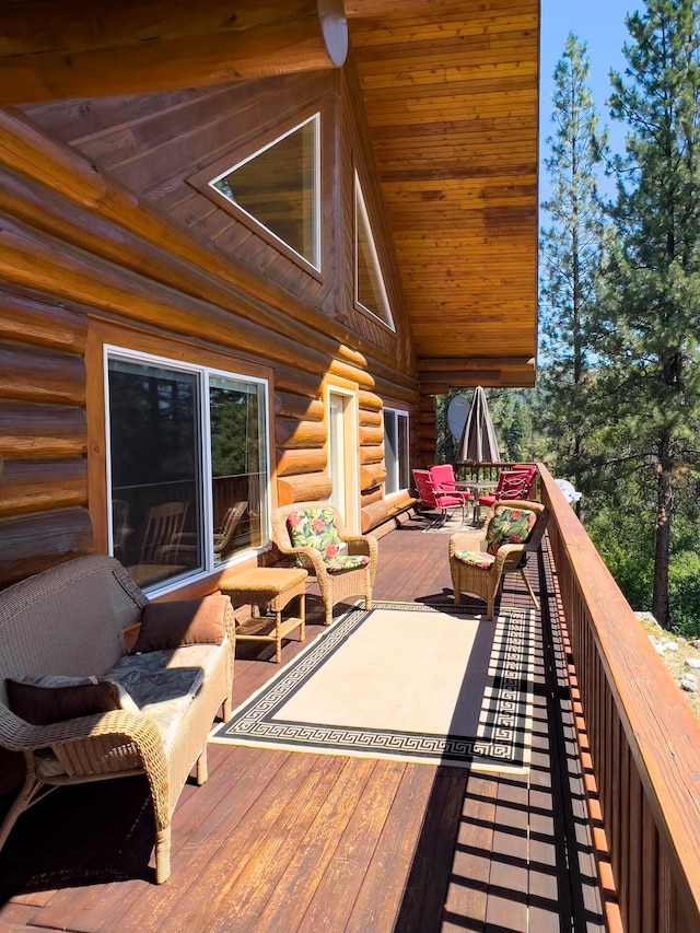 deck with an outdoor hangout area