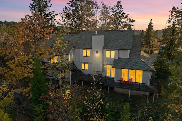 4203 S Suncrest Ln, Veradale, WA 99037 - rear view of property with a shingled roof, a deck, and a chimney