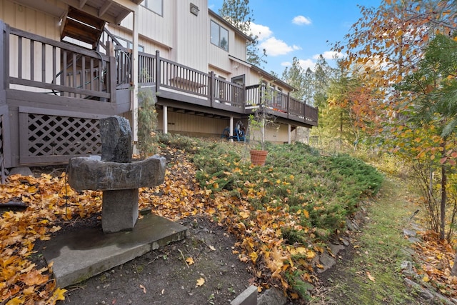 exterior space featuring a wooden deck