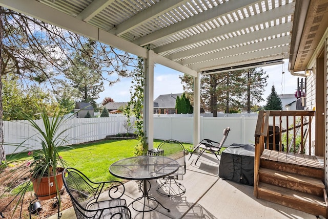 view of patio / terrace with outdoor dining space, a fenced backyard, and a pergola