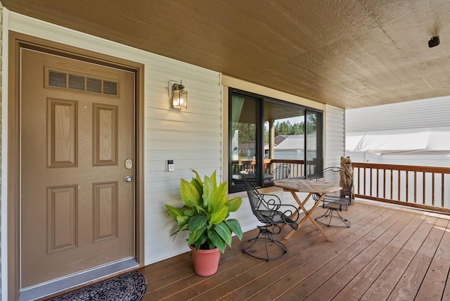 property entrance with a porch