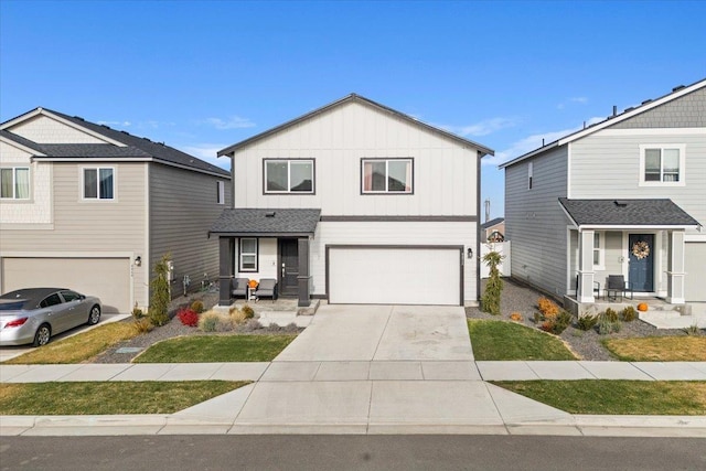 traditional home featuring driveway, an attached garage, and board and batten siding