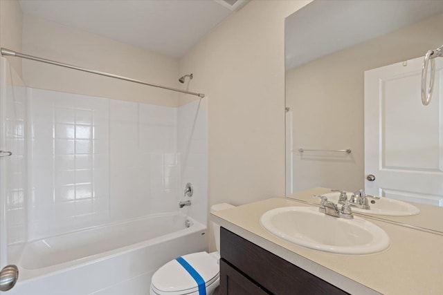 bathroom featuring shower / tub combination, vanity, and toilet