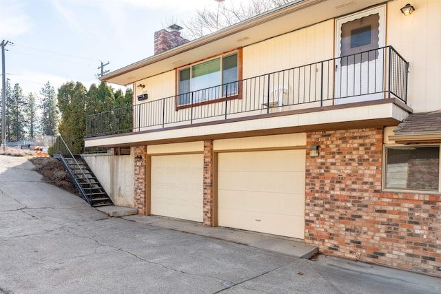 exterior space with concrete driveway