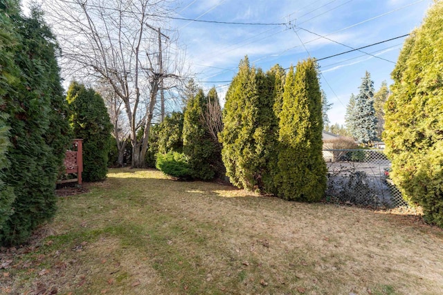 view of yard featuring fence