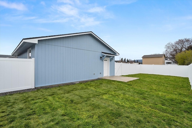 exterior space with a fenced backyard