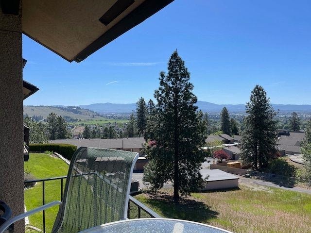 balcony featuring a mountain view