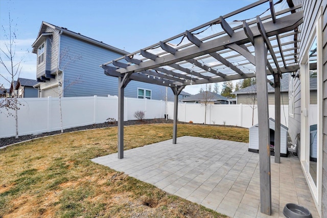 view of patio / terrace with a fenced backyard and a pergola