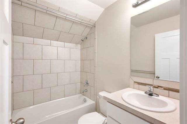 full bathroom featuring  shower combination, vanity, toilet, and decorative backsplash