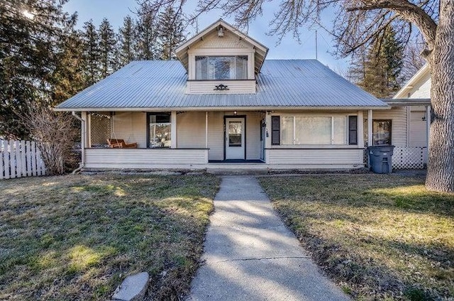 603 N Main St, Colville, WA 99114 - view of front of property with a porch and metal roof