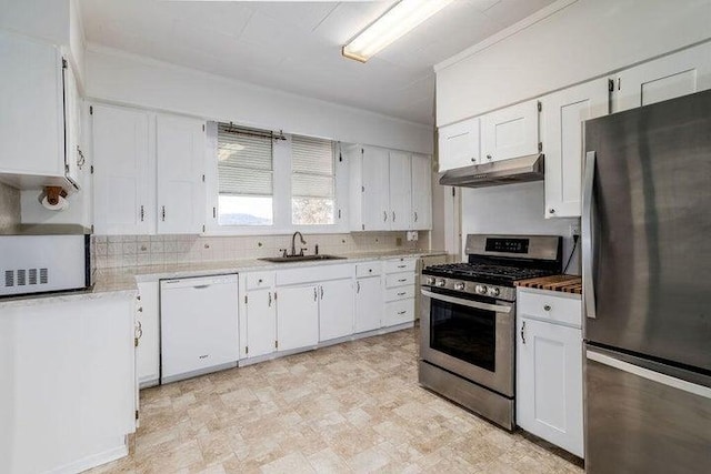 603 N Main St, Colville, WA 99114 - kitchen featuring appliances with stainless steel finishes, under cabinet range hood, a sink, and white cabinetry