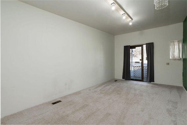 603 N Main St, Colville, WA 99114 - spare room featuring light carpet