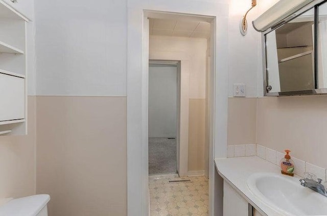 603 N Main St, Colville, WA 99114 - bathroom featuring vanity and toilet
