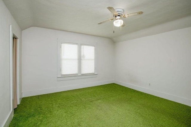 603 N Main St, Colville, WA 99114 - empty room with vaulted ceiling, carpet floors, and baseboards