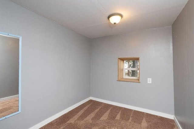 603 N Main St, Colville, WA 99114 - unfurnished room with dark carpet and baseboards