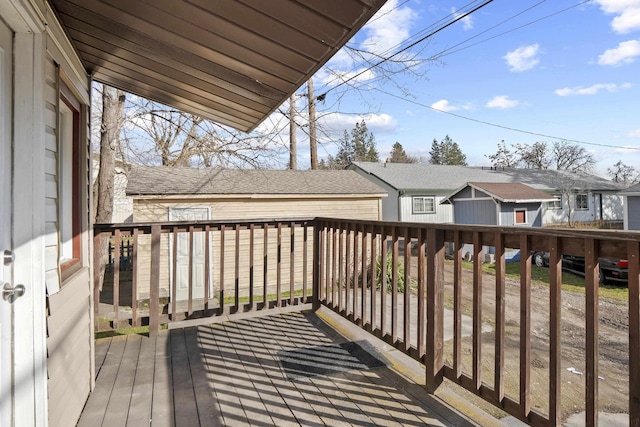 wooden deck with a residential view