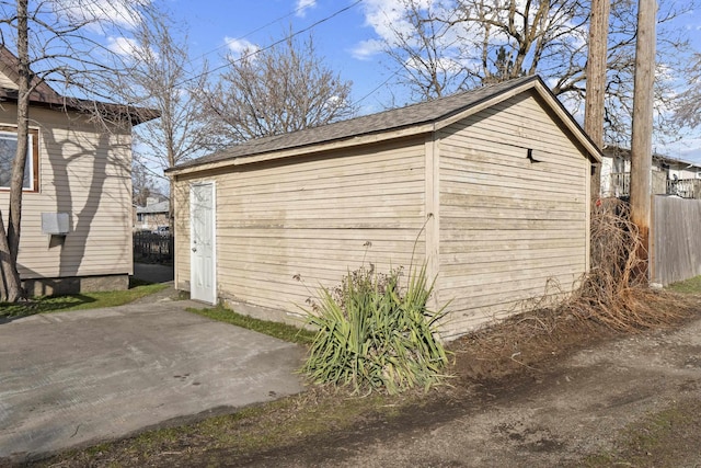 garage featuring fence