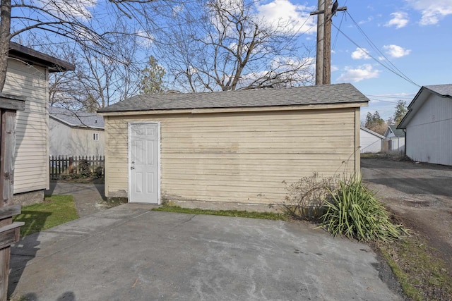 garage featuring fence