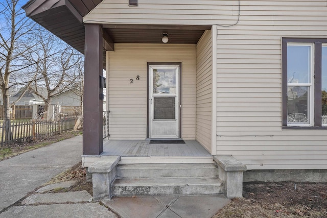 property entrance featuring fence