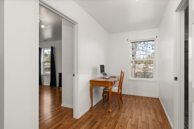 office area featuring wood finished floors and baseboards