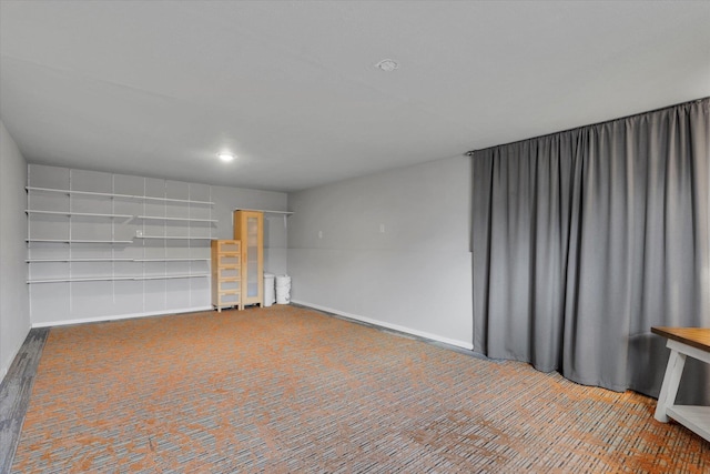 garage with baseboards