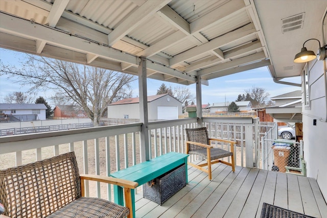 deck with an outdoor structure