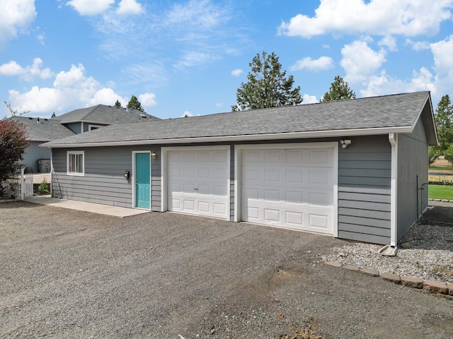 detached garage with fence