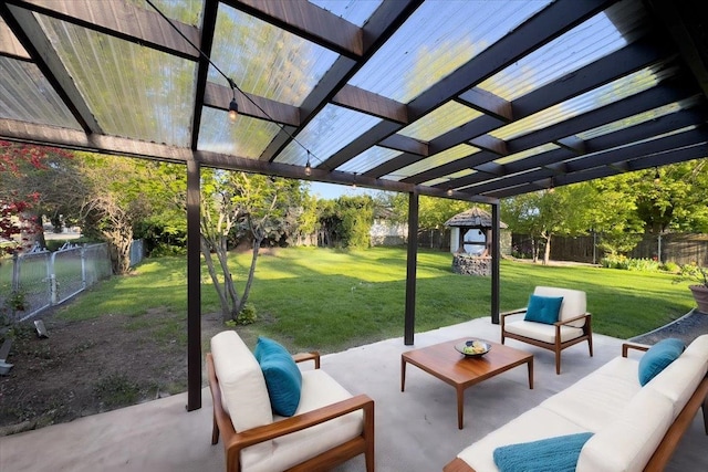 view of patio / terrace with a fenced backyard, an outdoor living space, and a pergola