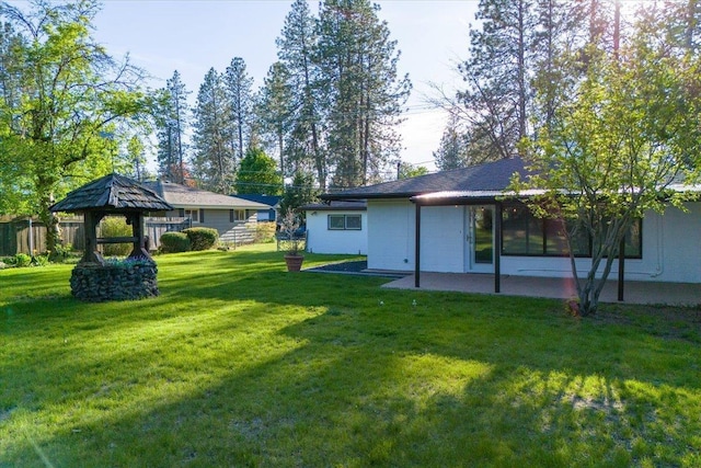 view of yard with a patio area and fence