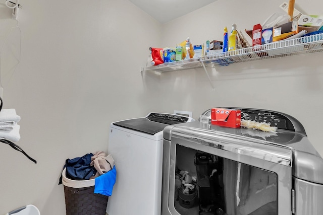 laundry area featuring laundry area and separate washer and dryer