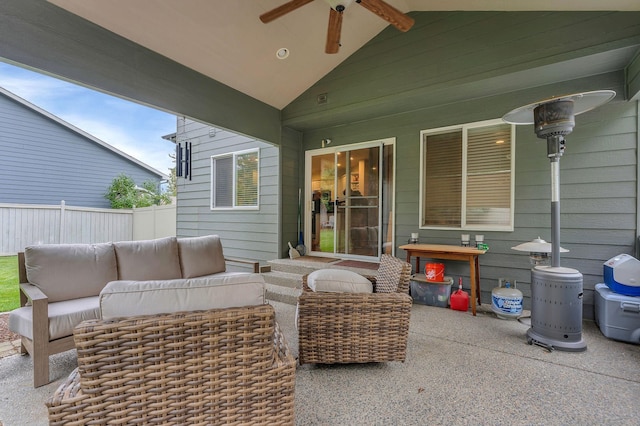 view of patio / terrace with outdoor lounge area, fence, and a ceiling fan