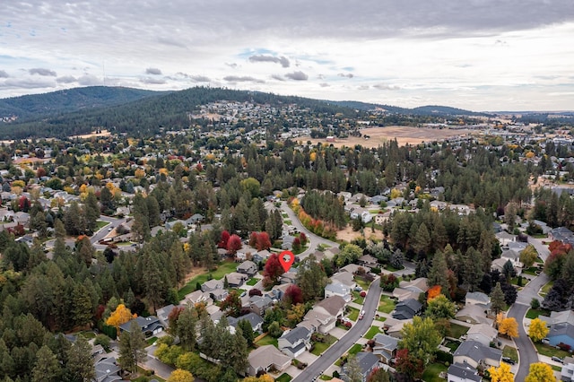 birds eye view of property featuring a residential view and a mountain view