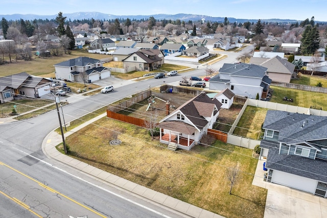 bird's eye view featuring a mountain view and a residential view