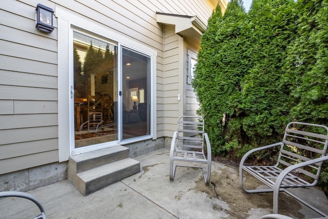 entrance to property with a patio area