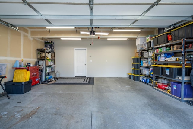 garage featuring a garage door opener