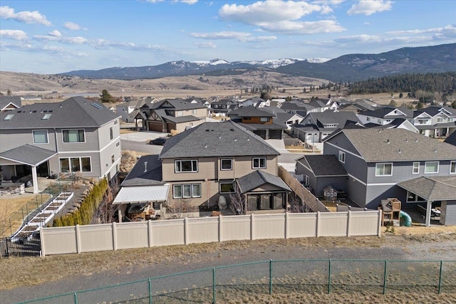 bird's eye view featuring a mountain view and a residential view