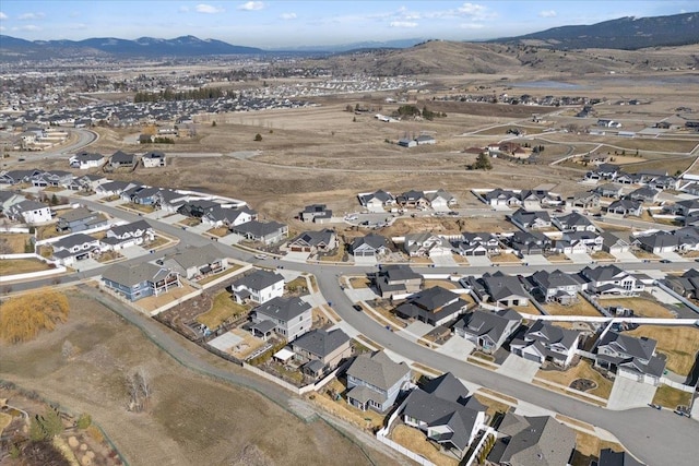 birds eye view of property featuring a residential view and a mountain view