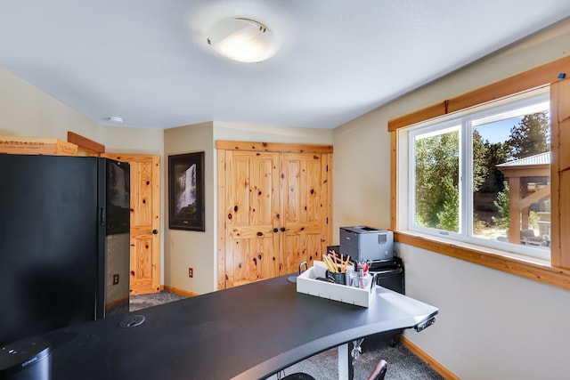 office area featuring baseboards