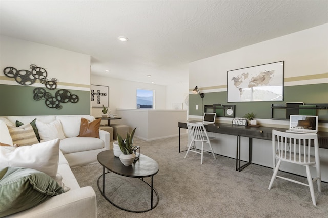 carpeted living room with recessed lighting and a textured ceiling