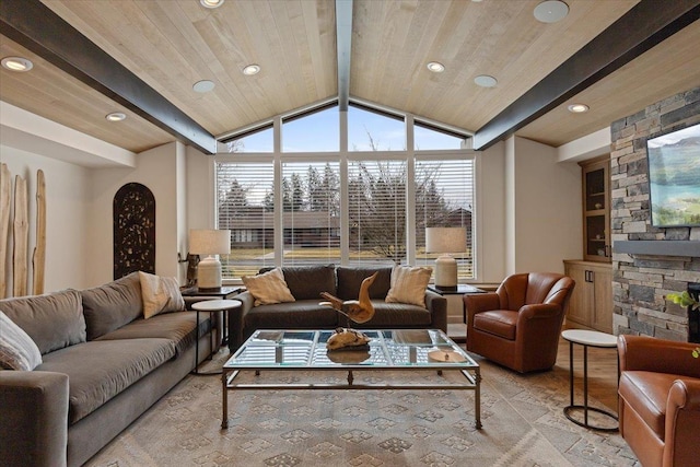 living room with vaulted ceiling with beams, recessed lighting, wood ceiling, and a fireplace