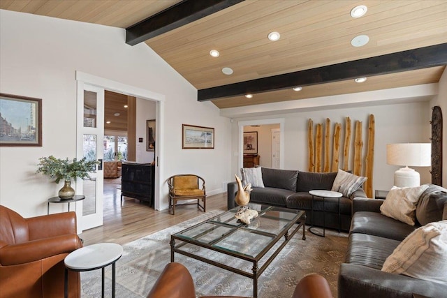 living area featuring recessed lighting, vaulted ceiling with beams, and wood finished floors