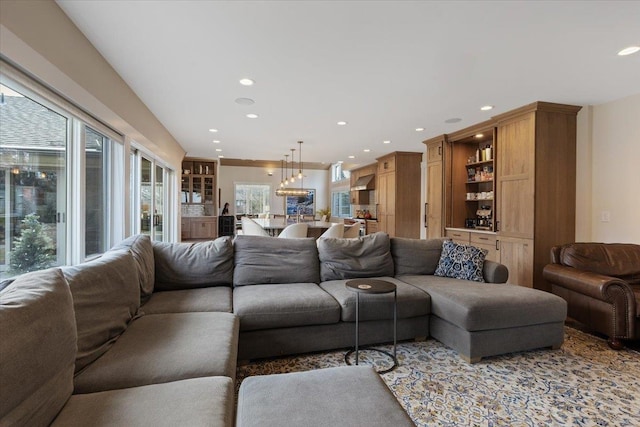 living room with a wealth of natural light and recessed lighting