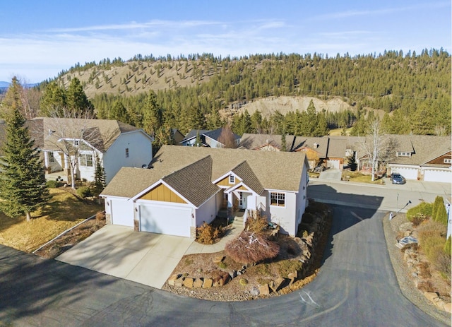 bird's eye view with a forest view