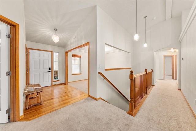 711 W Bolan Ave, Spokane, WA 99224 - carpeted entrance foyer with baseboards, arched walkways, and lofted ceiling