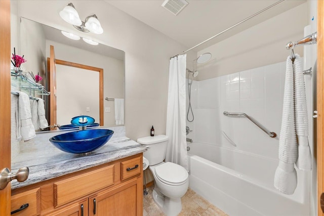 711 W Bolan Ave, Spokane, WA 99224 - full bath featuring vanity, toilet, and shower / tub combo with curtain