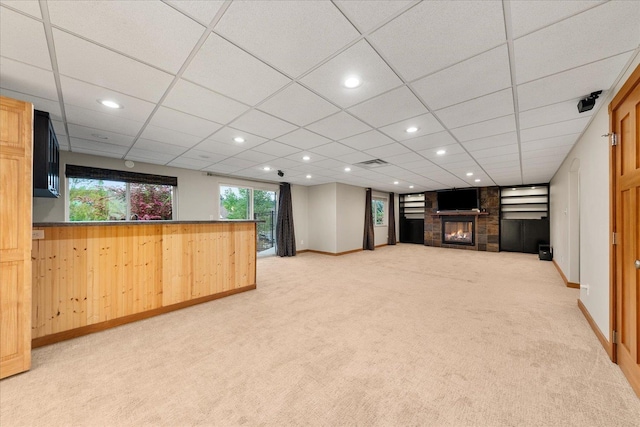 711 W Bolan Ave, Spokane, WA 99224 - basement with a large fireplace, light colored carpet, baseboards, and recessed lighting