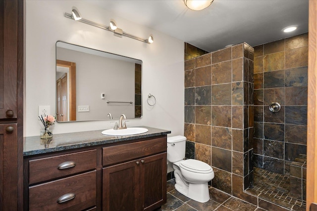 711 W Bolan Ave, Spokane, WA 99224 - full bathroom featuring a walk in shower, toilet, and vanity