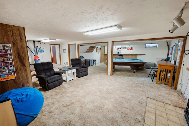 playroom with carpet floors, billiards, and a textured ceiling